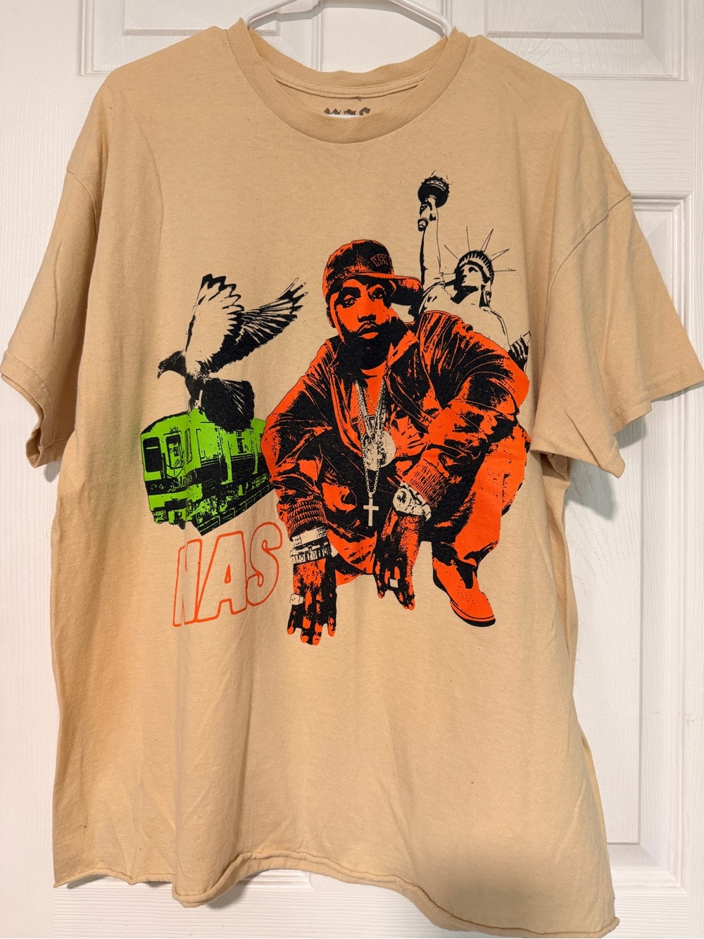 Beige NAS Graphic Tee with Orange & Green Print